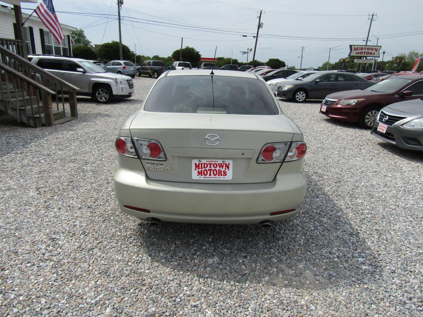 2006 Gold /Tan Mazda MAZDA6 i Sports Sedan (1YVFP80C465) with an 2.3L L4 DOHC 16V engine, Automatic transmission, located at 15016 S Hwy 231, Midland City, AL, 36350, (334) 983-3001, 31.306210, -85.495277 - Photo#6